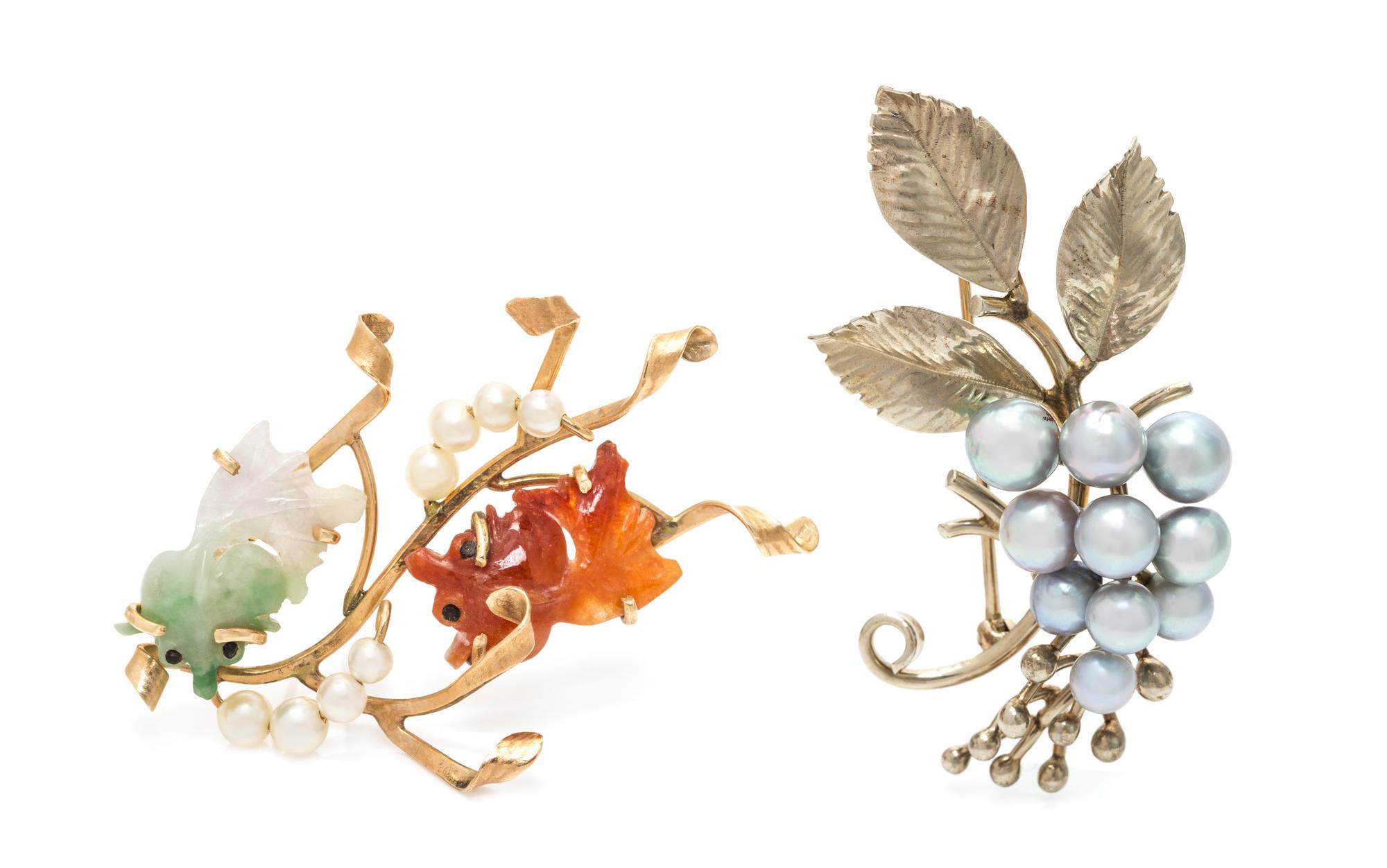 A Collection of Gold and Gem Brooches, Ming's, 12.70 dwts.