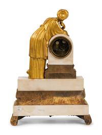 A Louis Philippe Gilt Bronze and White Marble Mantel Clock