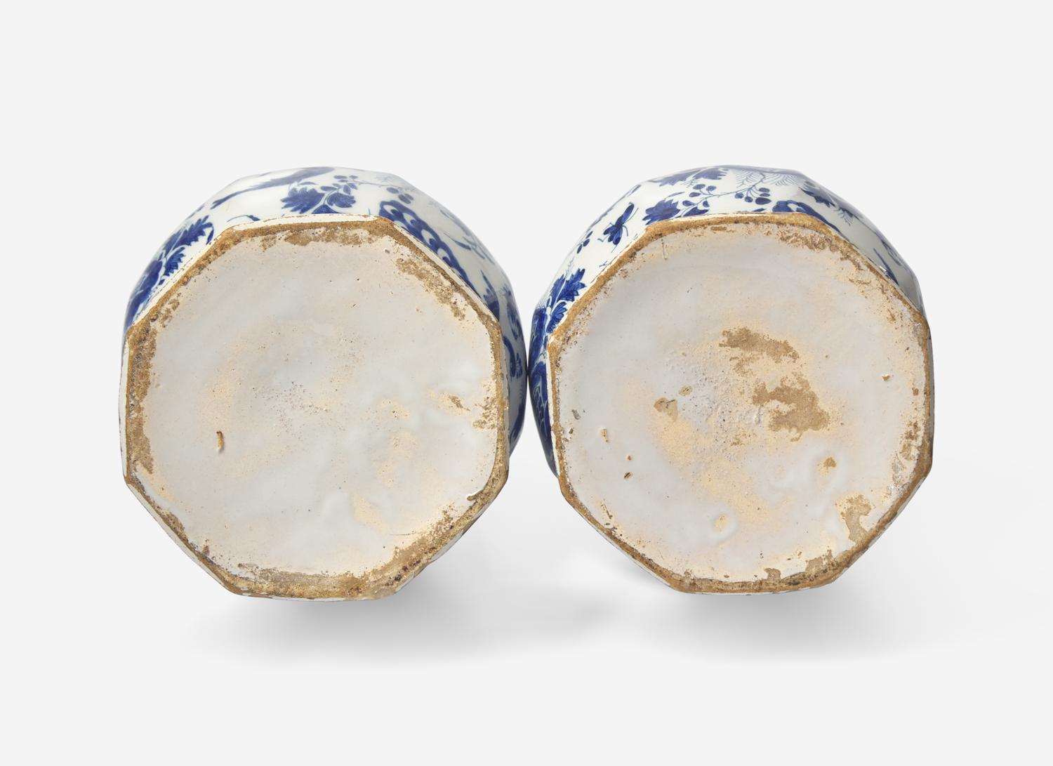 A Pair of Delft Blue and White Bottle Vases