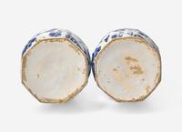 A Pair of Delft Blue and White Bottle Vases