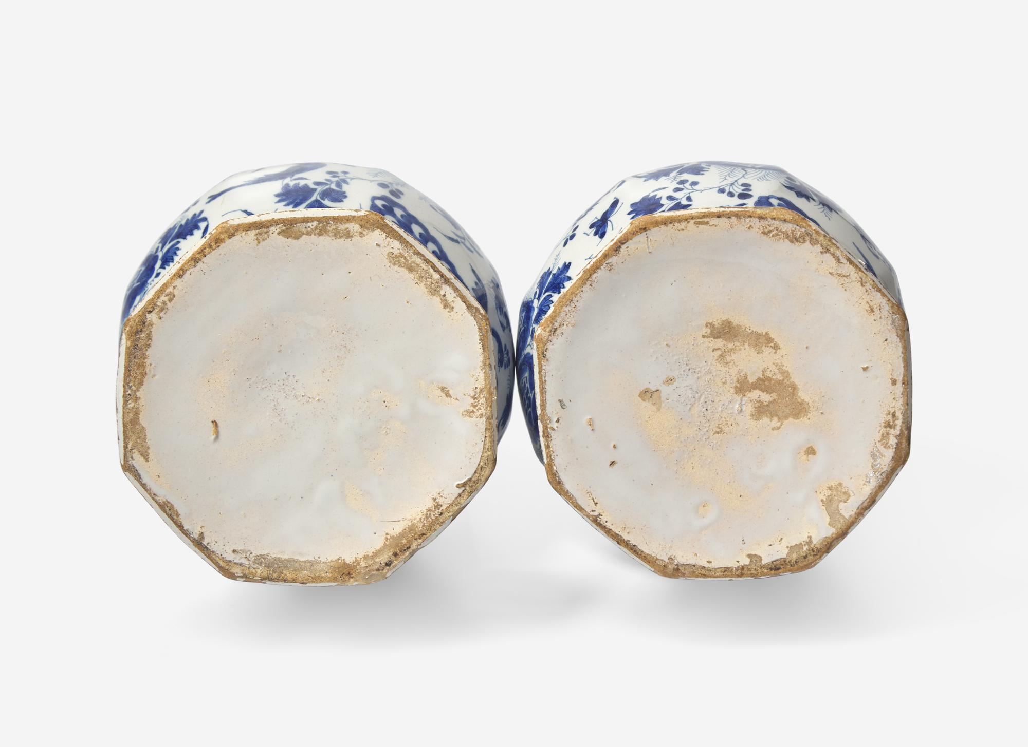 A Pair of Delft Blue and White Bottle Vases