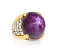 An 18 Karat Yellow Gold, Star Ruby and Diamond Ring, 13.60 dwts.