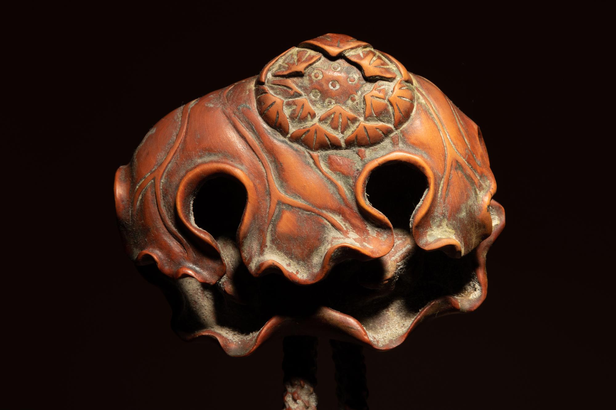 A Chinese Carved Boxwood 'Lotus and Frog' Ruyi Scepter