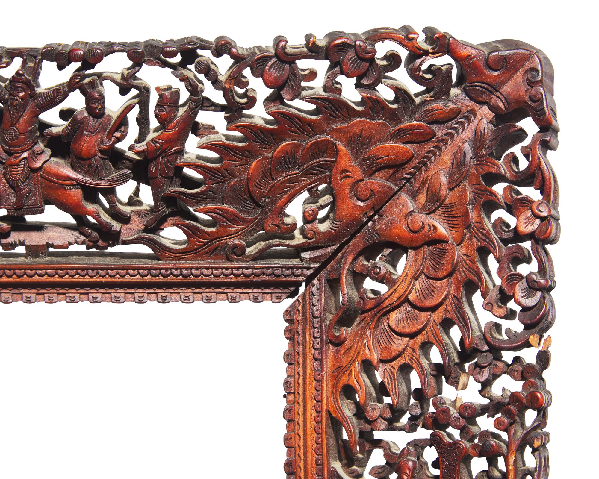 A pair of Chinese Export carved and stained wood frames, 19th century