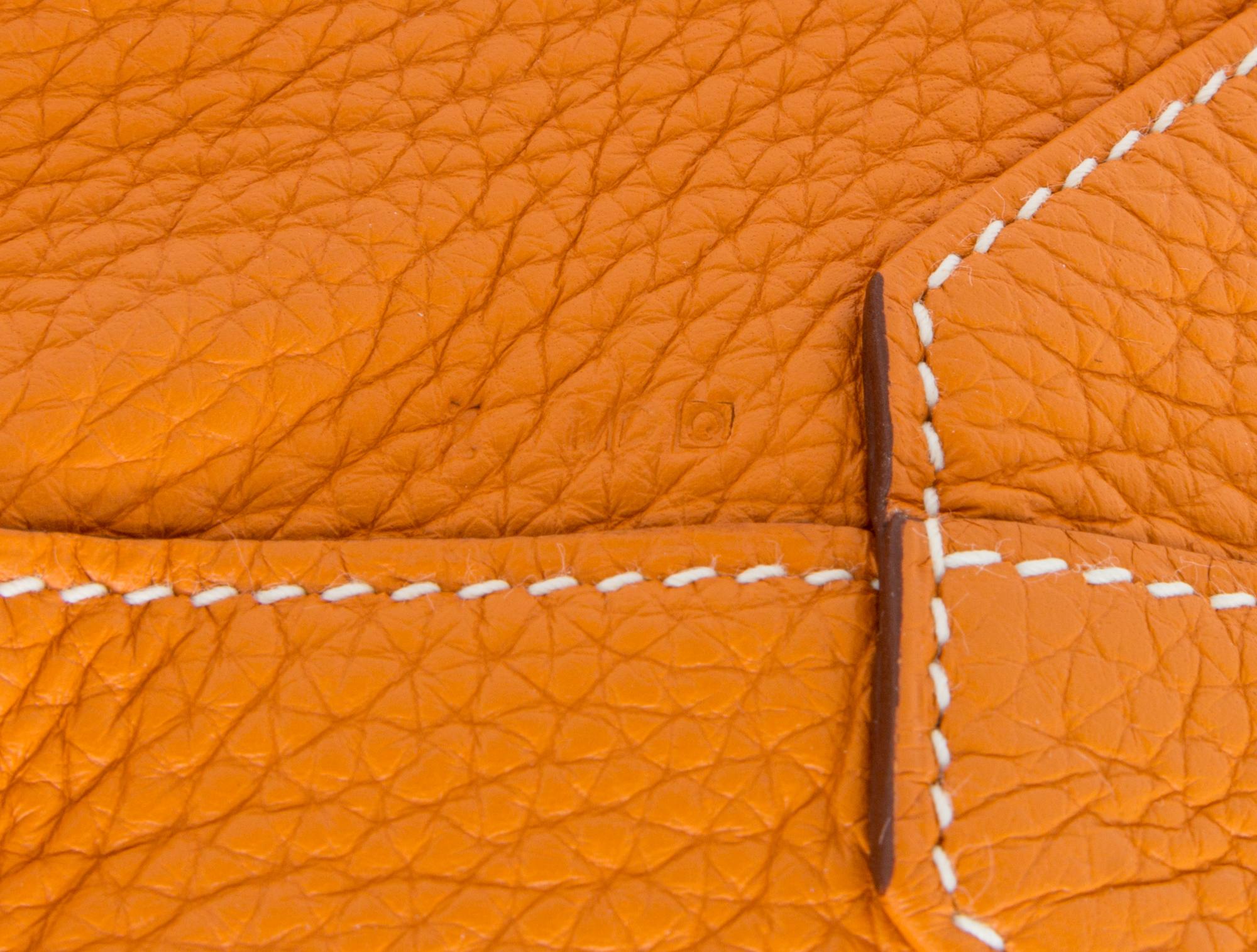An Hermes Orange/Gold 45cm Taurillon Clemence Double Sens Tote, 17.5" x 15.5" x 5".