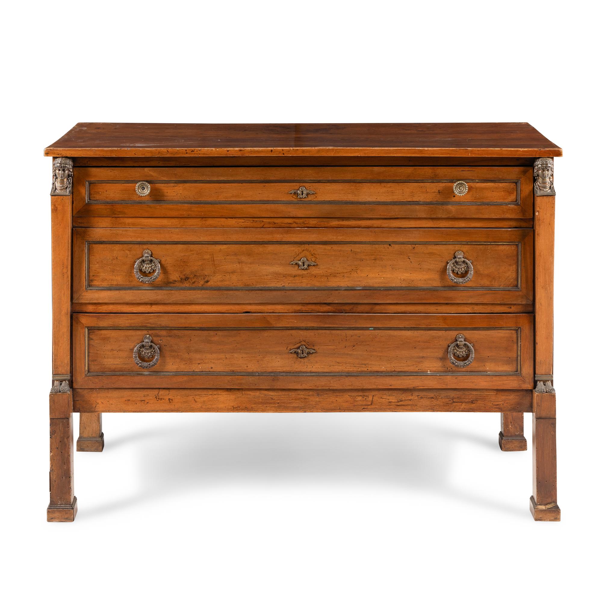 An Italian Neoclassical Gilt Metal Mounted Walnut Chest of Drawers