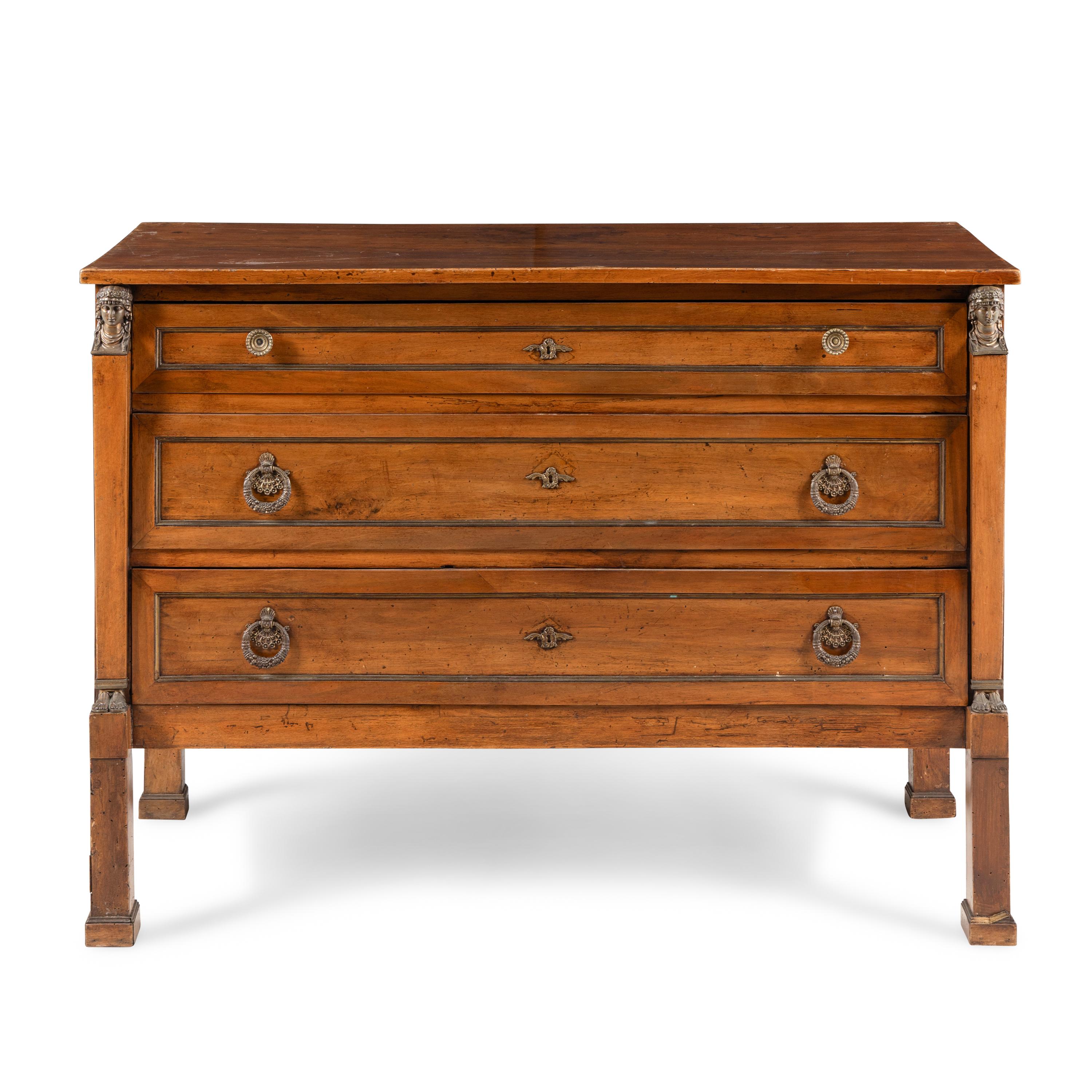 An Italian Neoclassical Gilt Metal Mounted Walnut Chest of Drawers