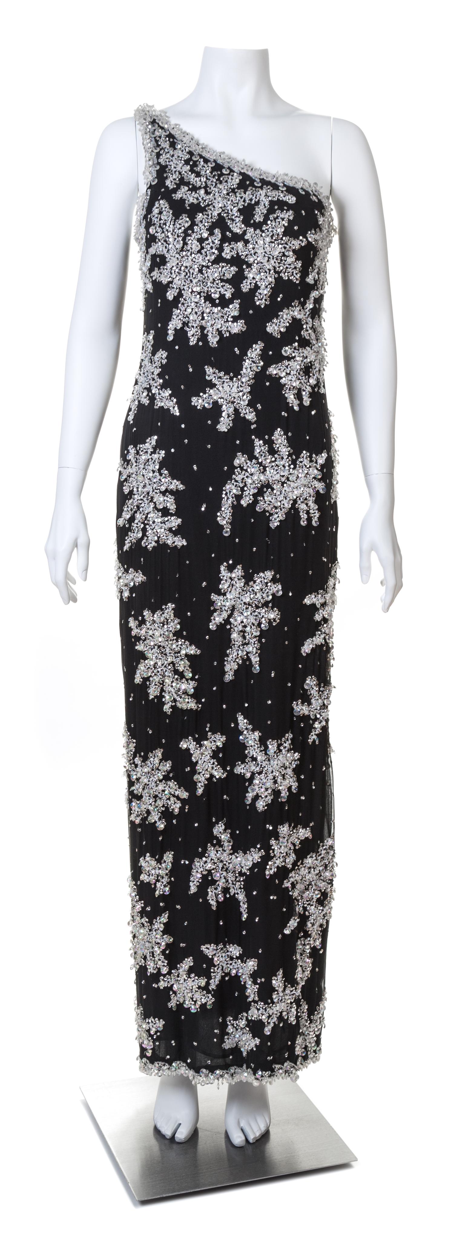 An Adolfo 1970s Black Chiffon One Shoulder Gown,