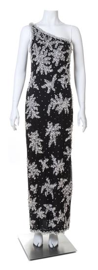 An Adolfo 1970s Black Chiffon One Shoulder Gown,