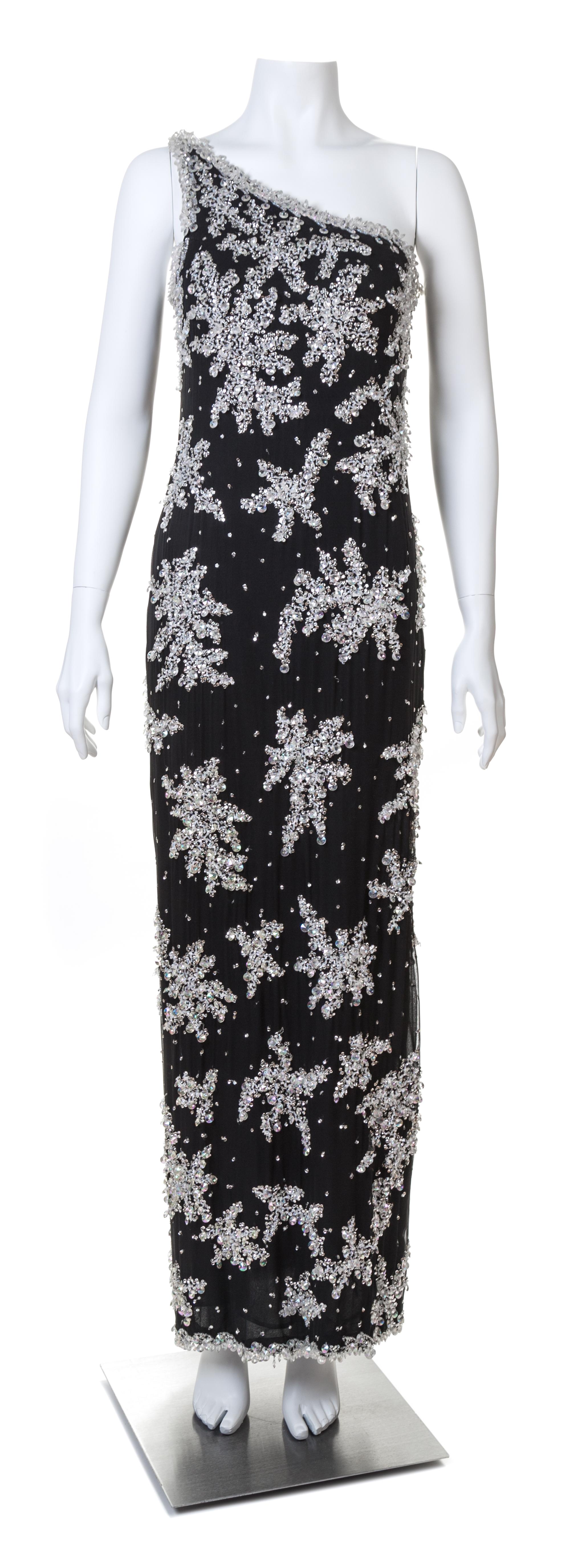 An Adolfo 1970s Black Chiffon One Shoulder Gown,