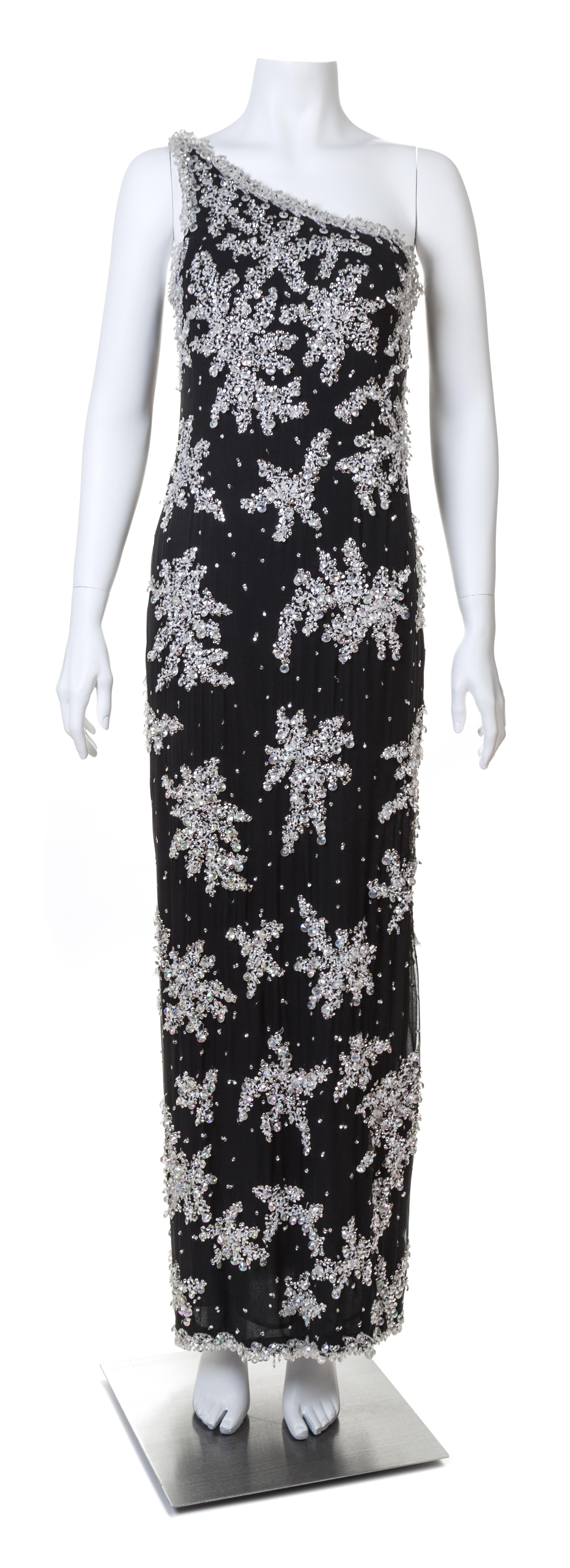 An Adolfo 1970s Black Chiffon One Shoulder Gown,