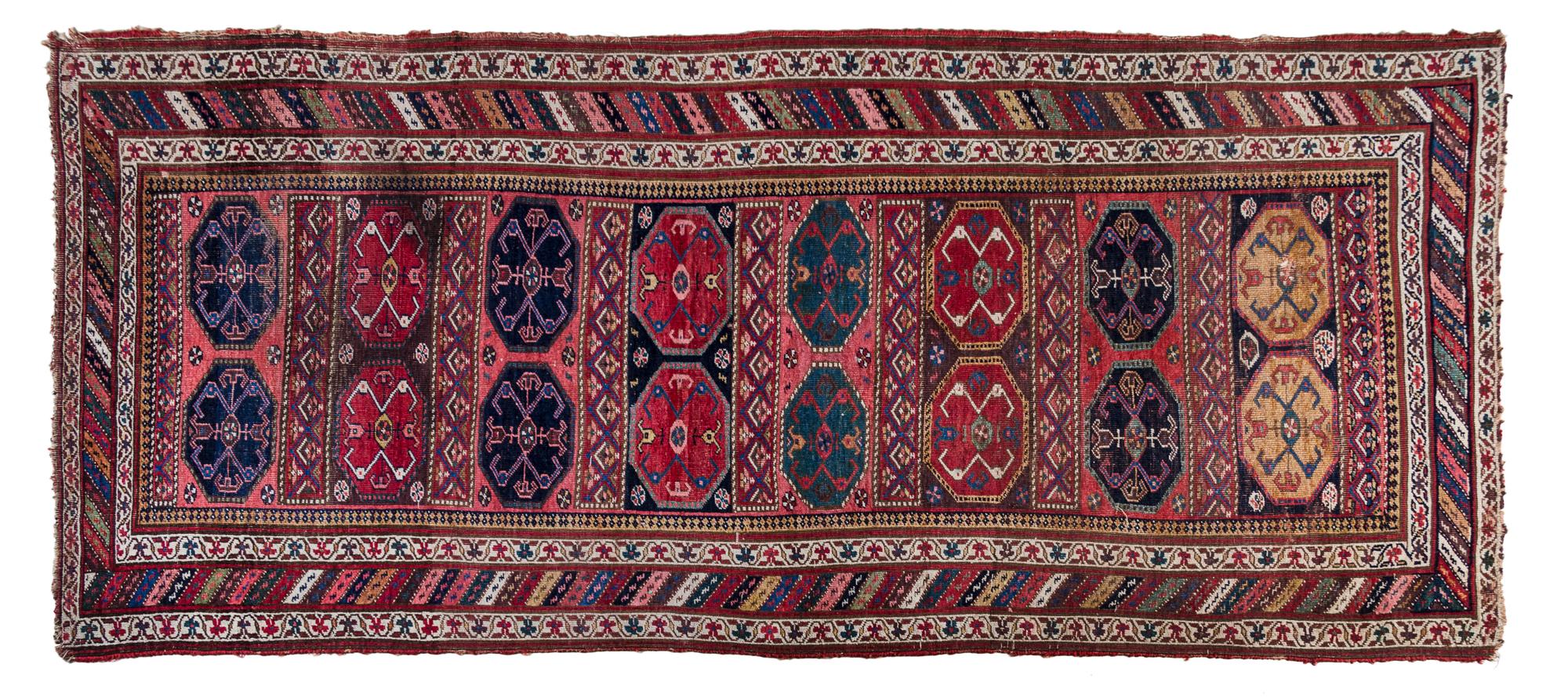 A Caucasian Wool Runner 10 feet 1 inch x 4 feet 4 inches. — LATE 19TH/EARLY 20TH CENTURY