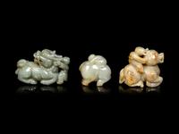 Three Chinese Celadon Jade Figures of Boys
