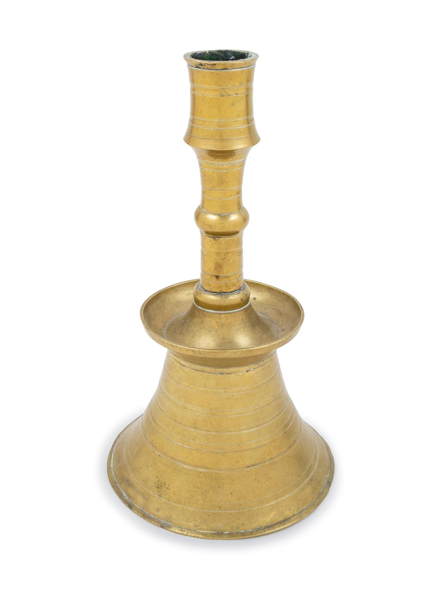 An Ottoman Cast Brass Lathe-Turned Candlestick