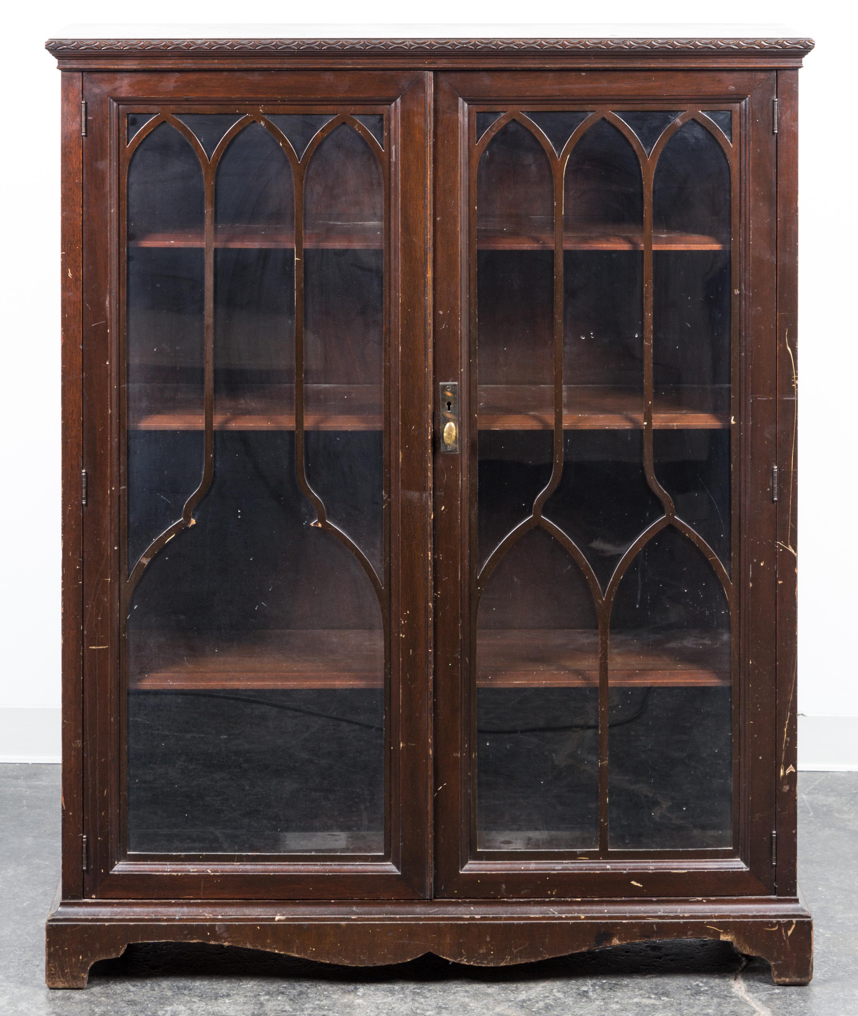 A Chippendale Style Mahogany Bookcase Height 53 x width 43 x depth 14 1/2 inches. — 20TH CENTURY