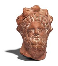 An Egyptian Terracotta Head of Serapis