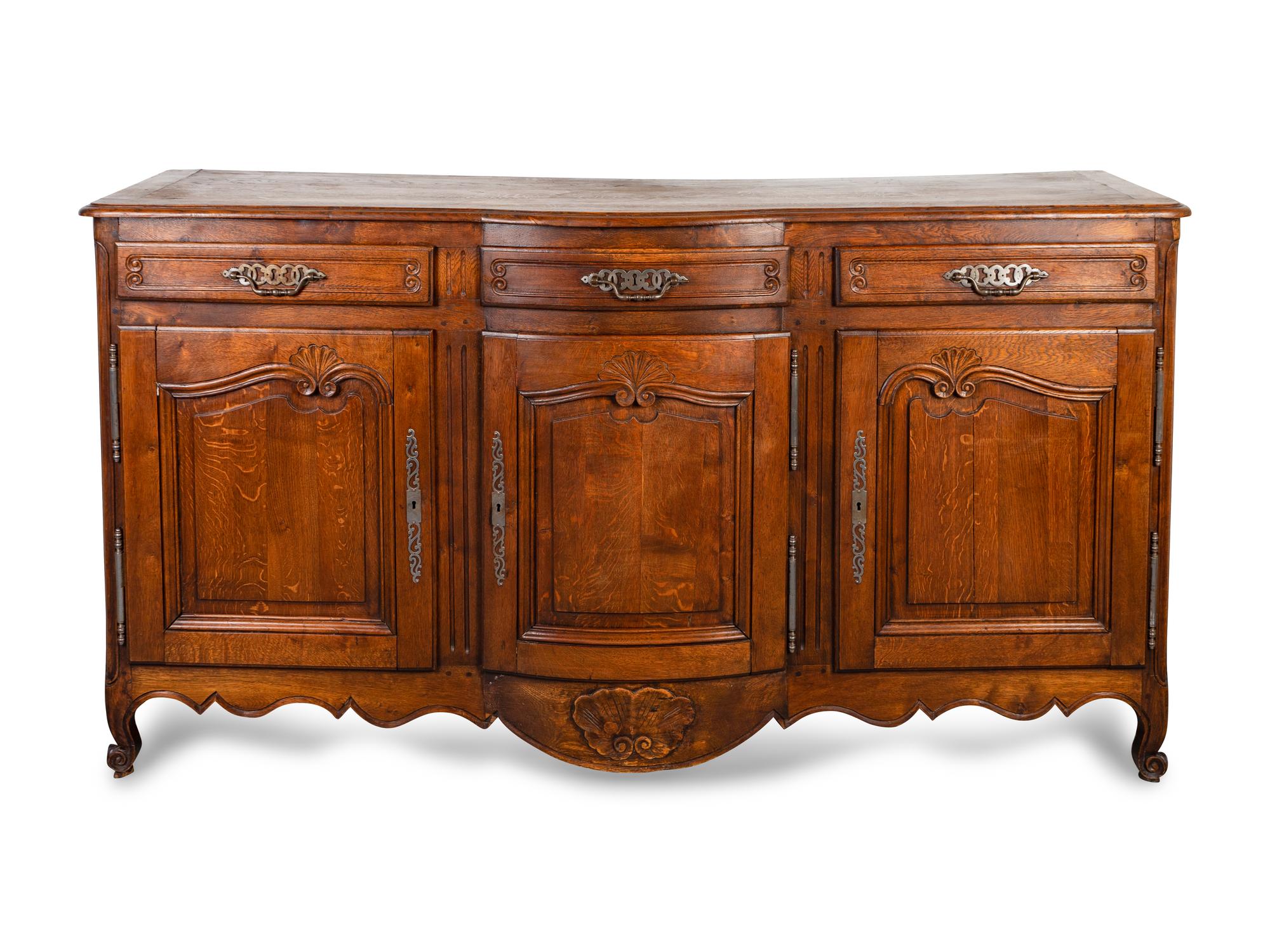 A Louis XV Provincial Style Carved Oak Buffet — 19TH CENTURY