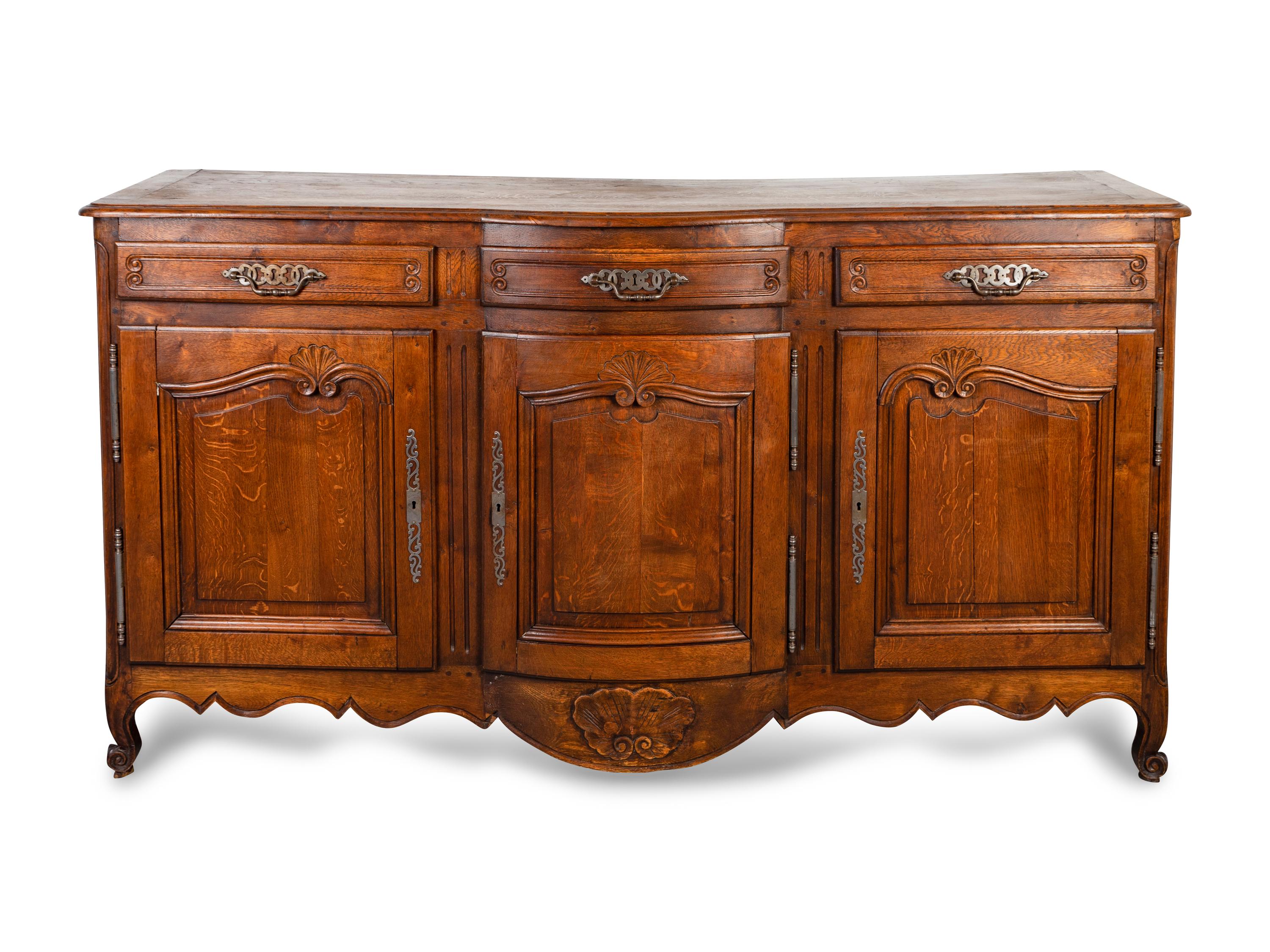 A Louis XV Provincial Style Carved Oak Buffet — 19TH CENTURY