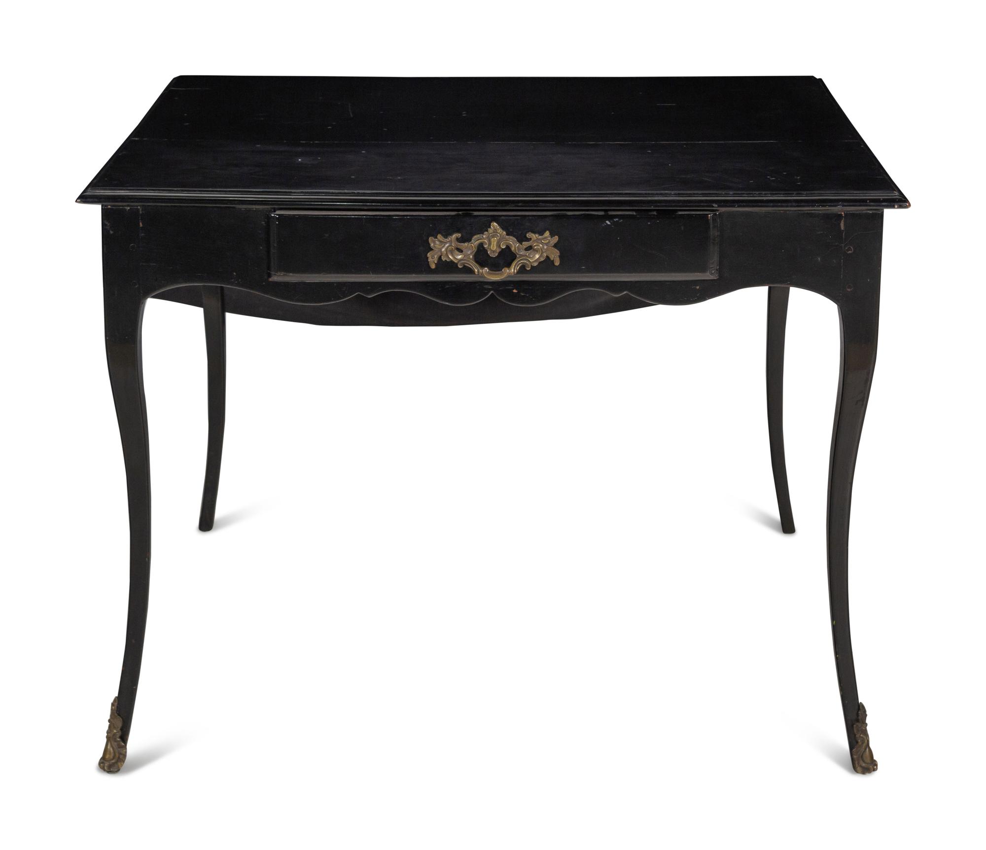 A Régence Gilt Bronze Mounted Ebonized Writing Table