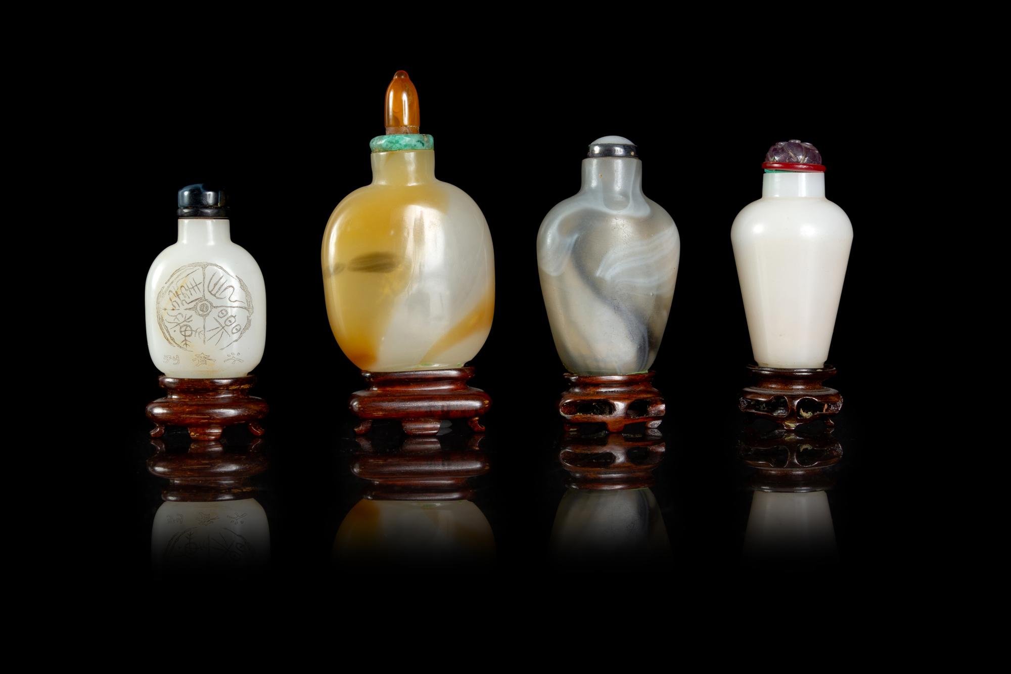 Four Chinese Peking Glass Snuff Bottles