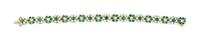 A Bicolor Gold, Diamond and Emerald Bracelet, 17.20 dwts.