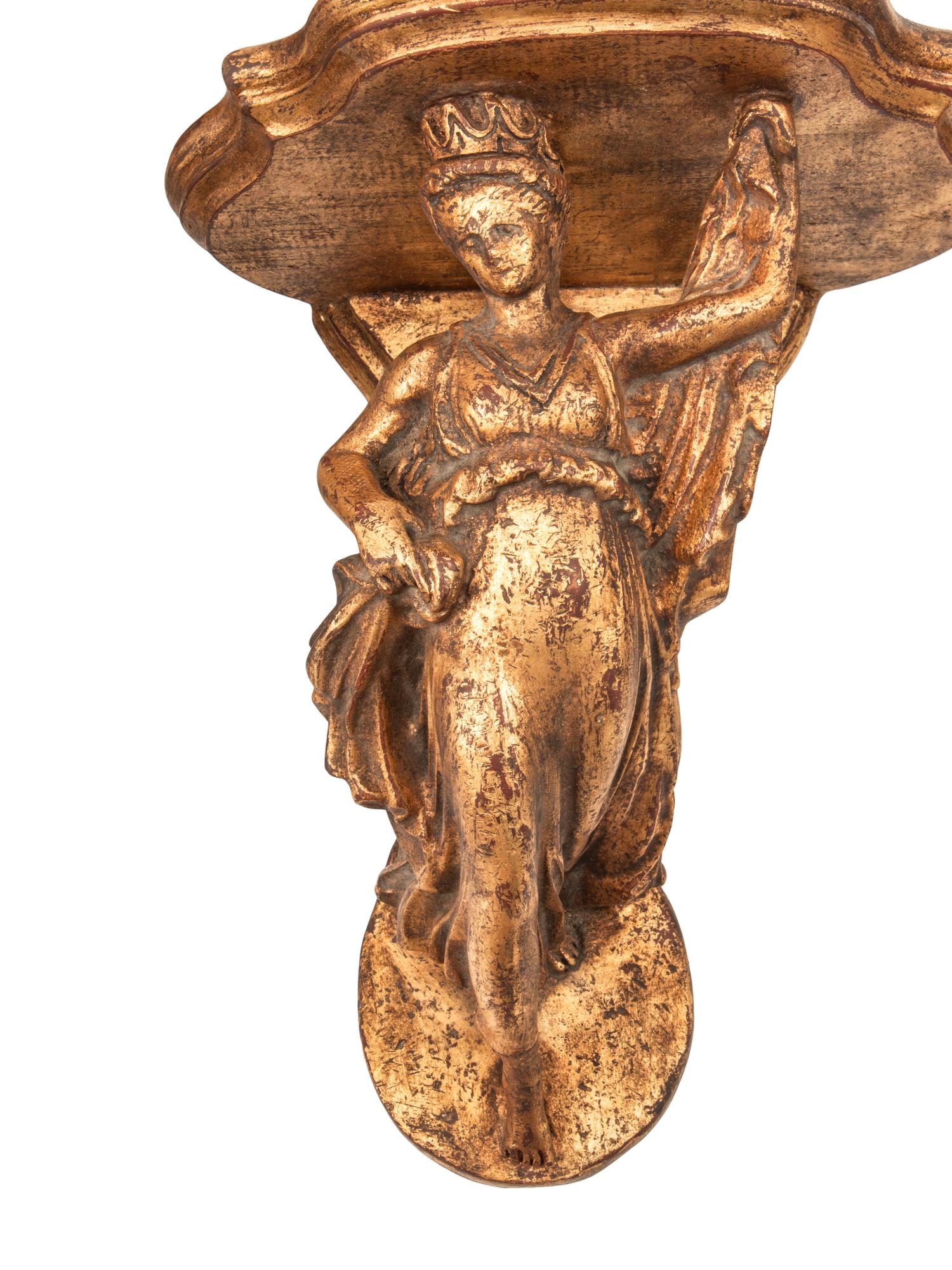 A Set of Four Italian Carved Giltwood Figural Wall Brackets
