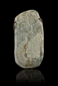 A Celadon Jade Plaque Carved with a Mexican Figure. Height 6 1/4 inches.