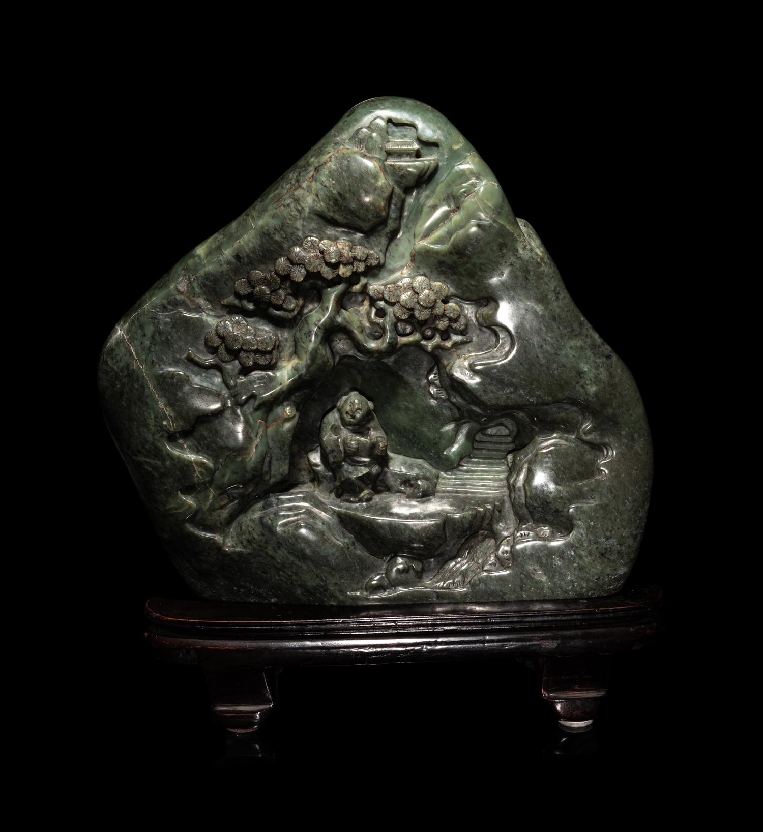 A Chinese Carved Spinach Jade 'Landscape' Boulder