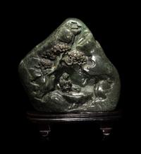 A Chinese Carved Spinach Jade 'Landscape' Boulder