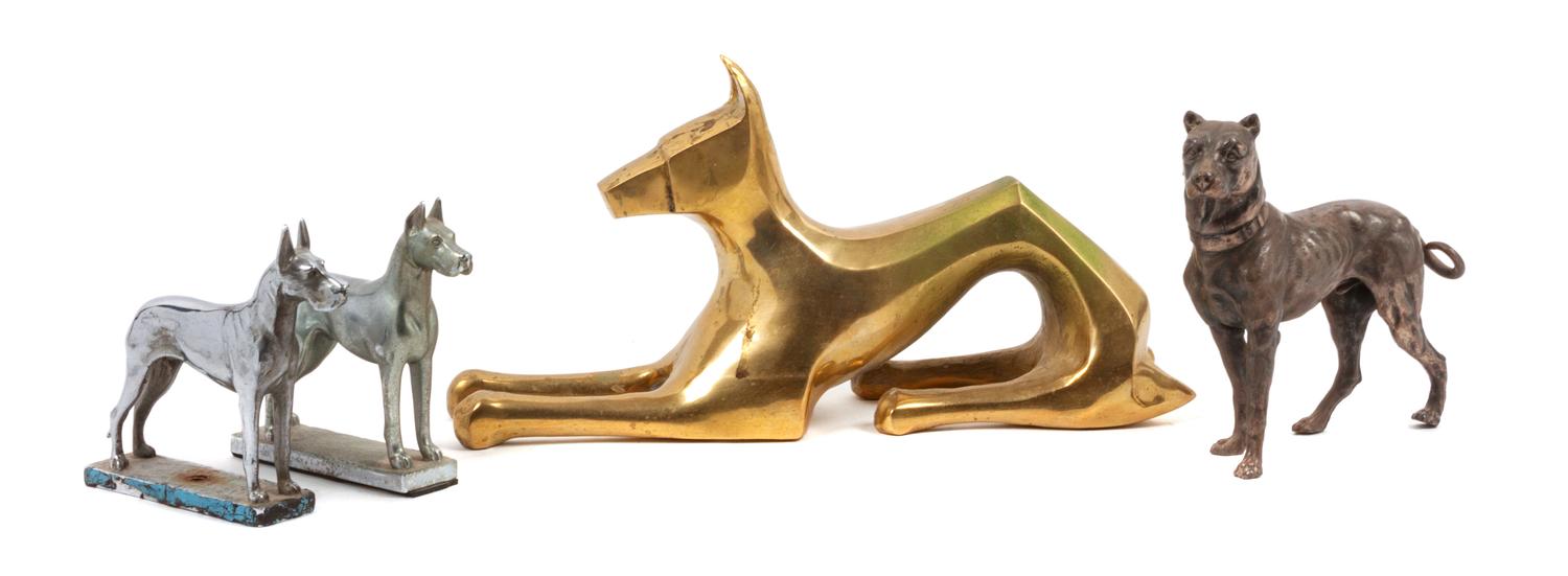 A Group of Four Great Dane Metal Sculptures Width of widest 12 1/4 inches.