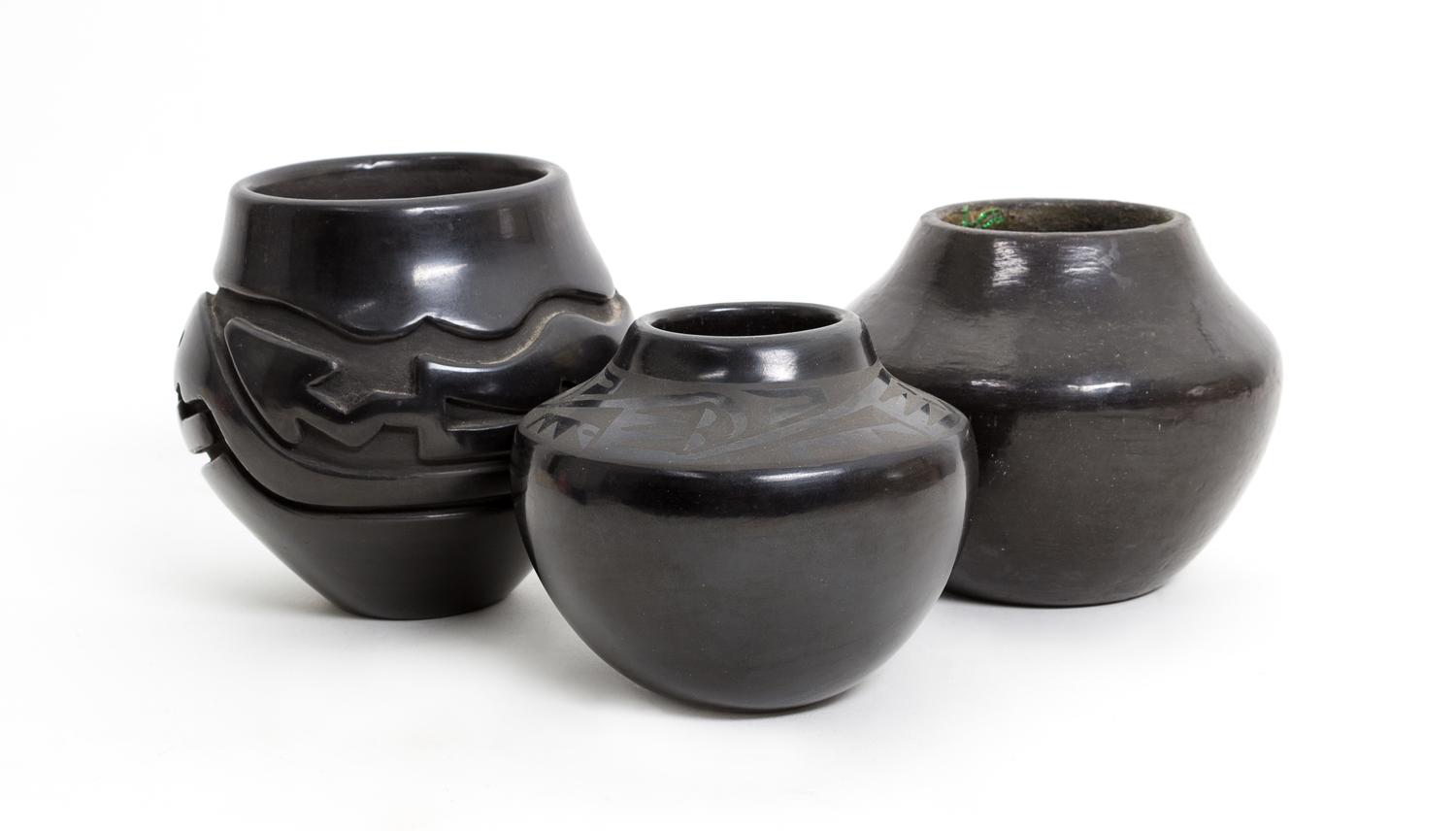 Three Blackware Pueblo Jars First height 4 x diameter 4 1/2 inches.