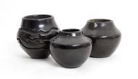 Three Blackware Pueblo Jars First height 4 x diameter 4 1/2 inches.