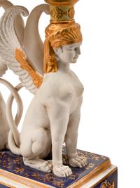 A Pair of Sevres Style Porcelain Figural Corbeilles