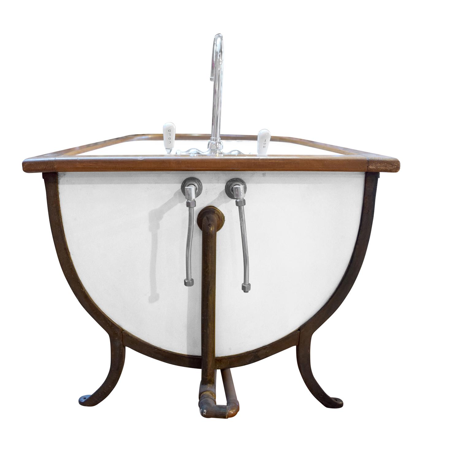 A Zinc and Wood Bathtub 60" W x 28" D x 31" H, 21" H to top of tub — United States, Early 20th Century