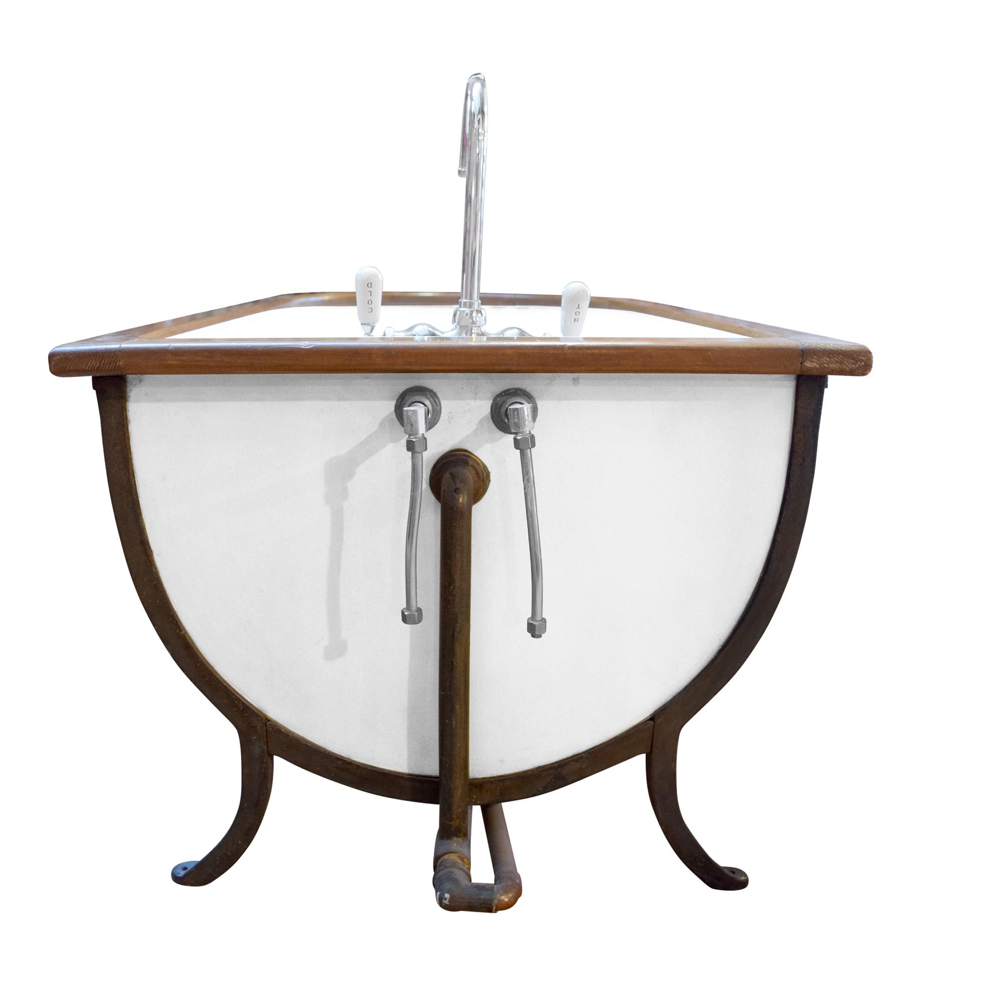 A Zinc and Wood Bathtub 60" W x 28" D x 31" H, 21" H to top of tub — United States, Early 20th Century
