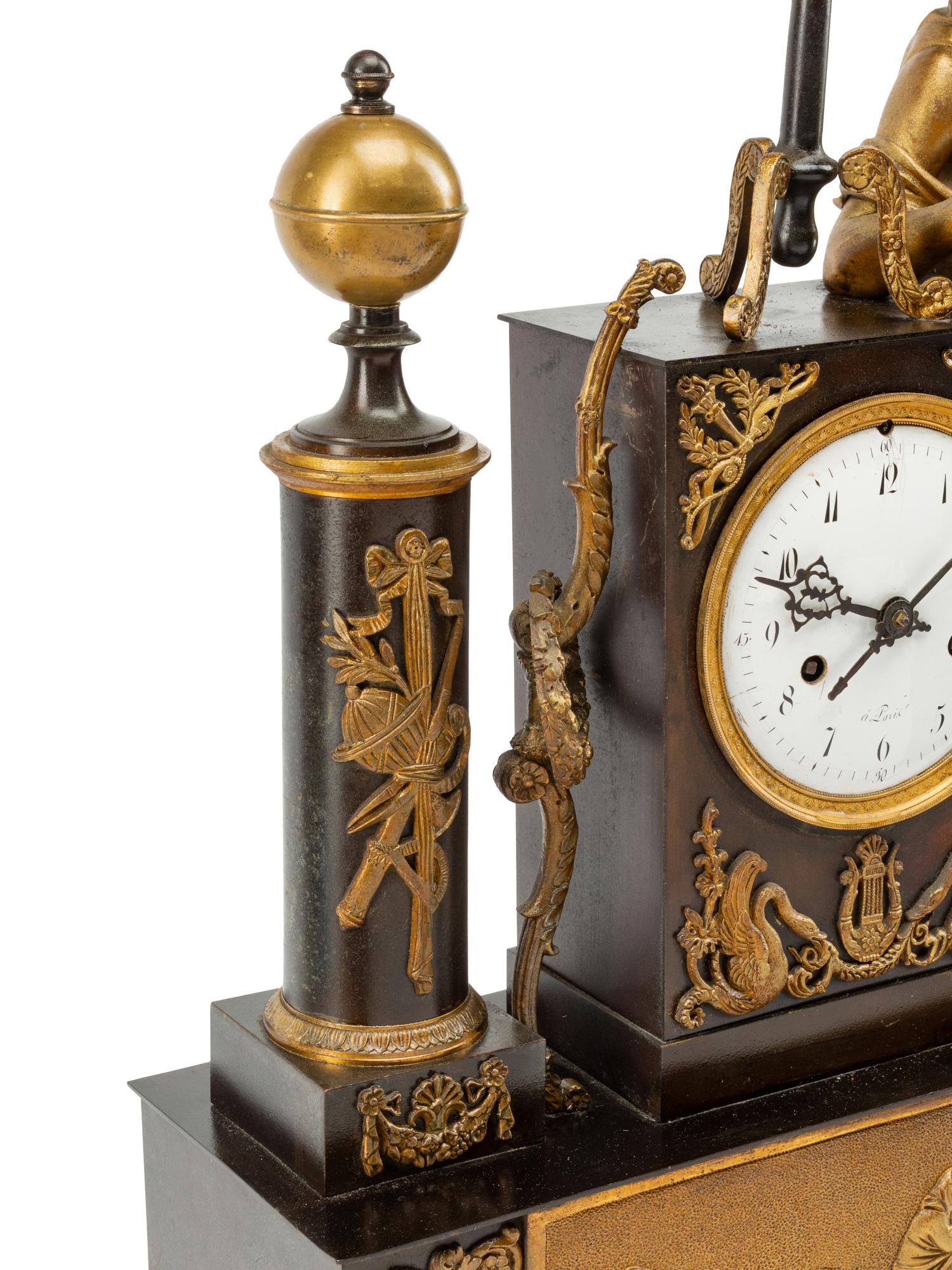 A Louis Philippe Gilt and Patinated Bronze Figural Mantel Clock