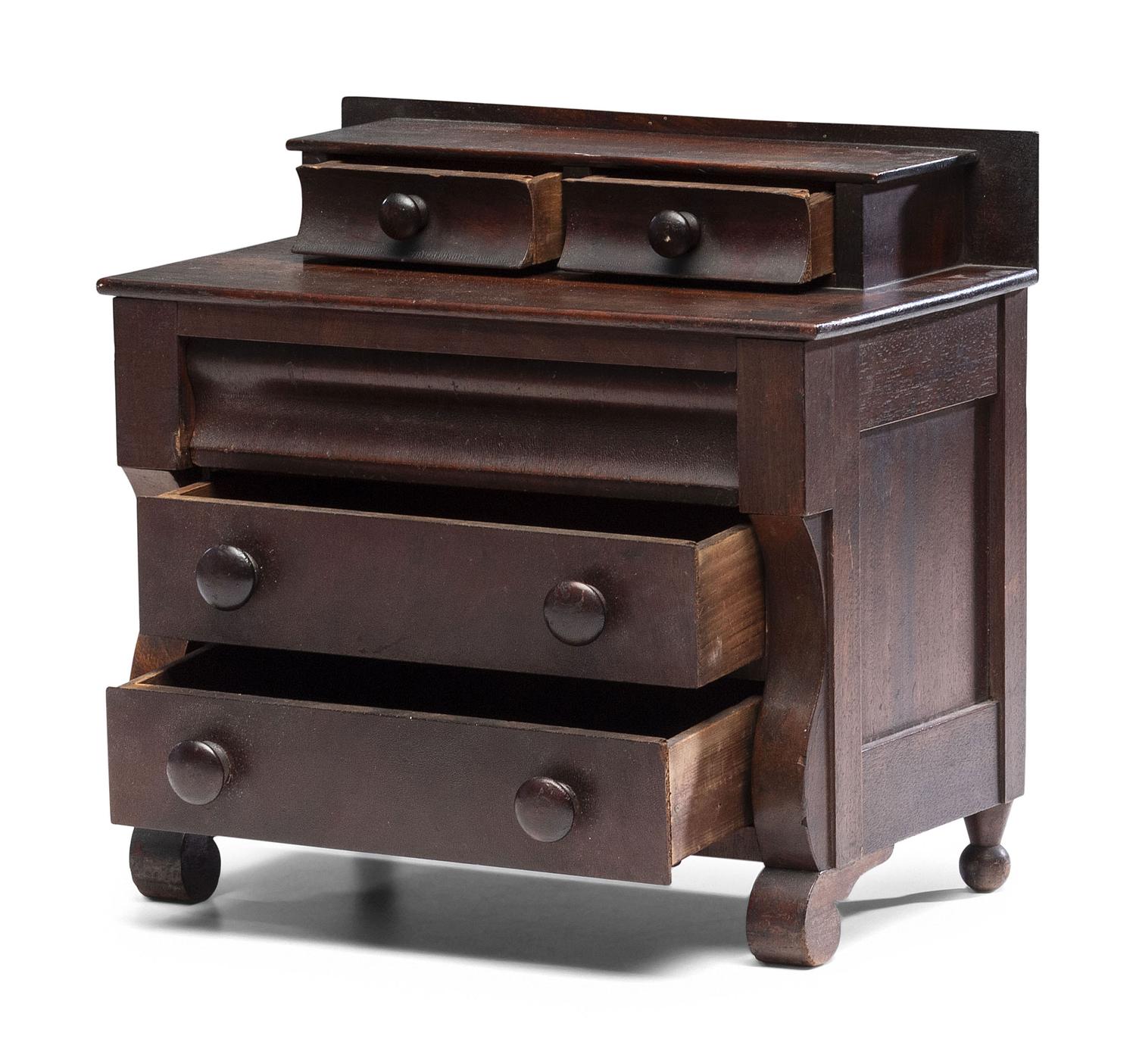 A Diminutive American Empire Mahogany Chest of Drawers