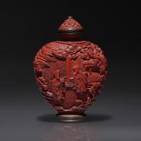 A Chinese Carved Cinnabar Lacquer Snuff Bottle, Qing Dynasty, 18th Century — 清中期 剔紅人物山水圖鼻煙壺