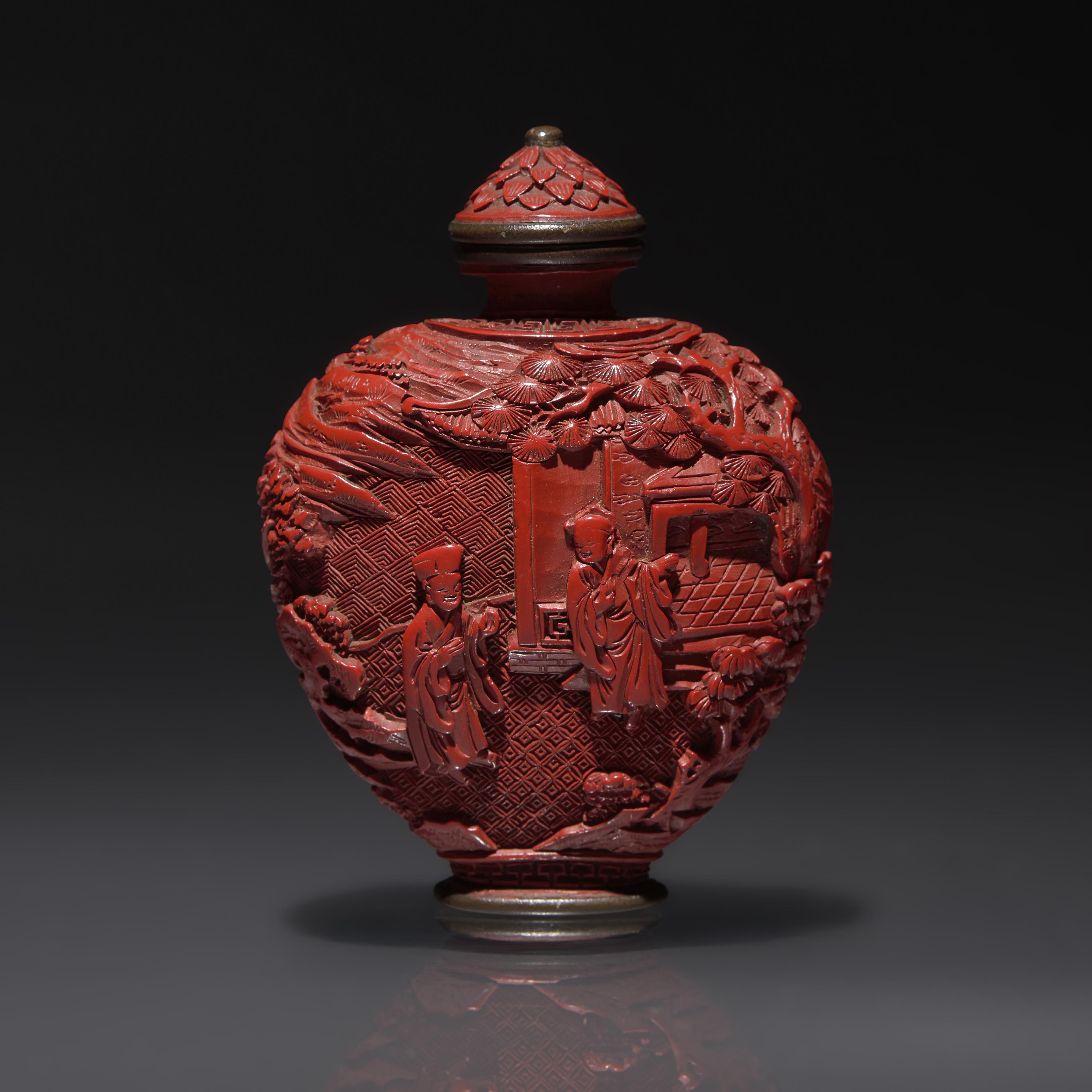 A Chinese Carved Cinnabar Lacquer Snuff Bottle, Qing Dynasty, 18th Century — 清中期 剔紅人物山水圖鼻煙壺