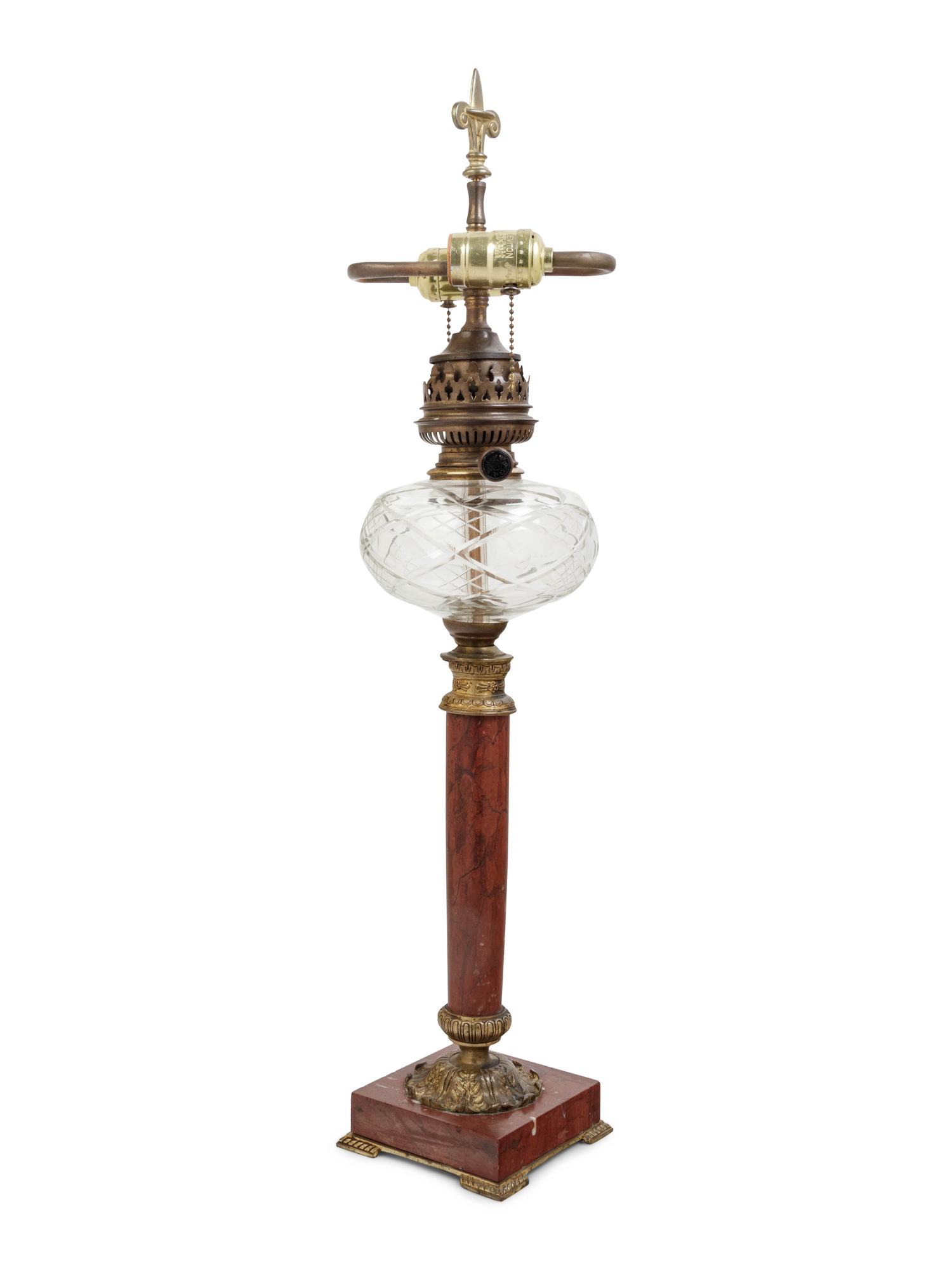 A Continental Gilt Bronze and Marble Fluid Lamp Converted to Electricity