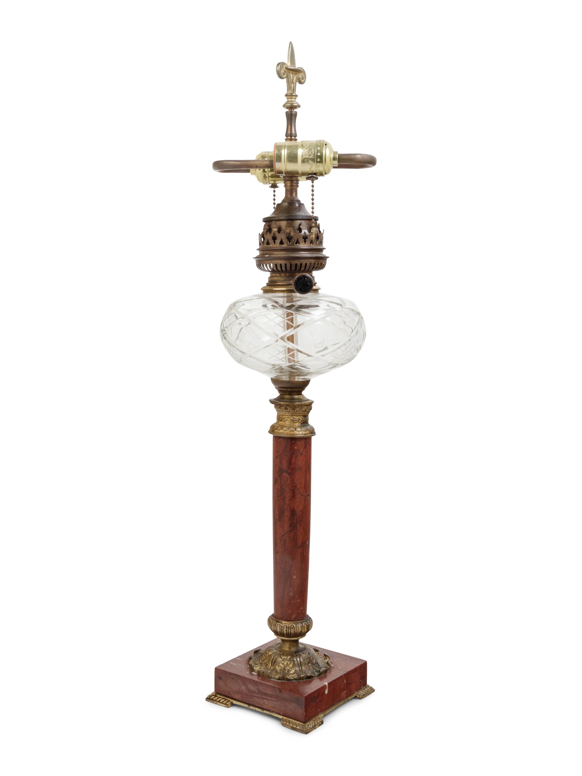 A Continental Gilt Bronze and Marble Fluid Lamp Converted to Electricity