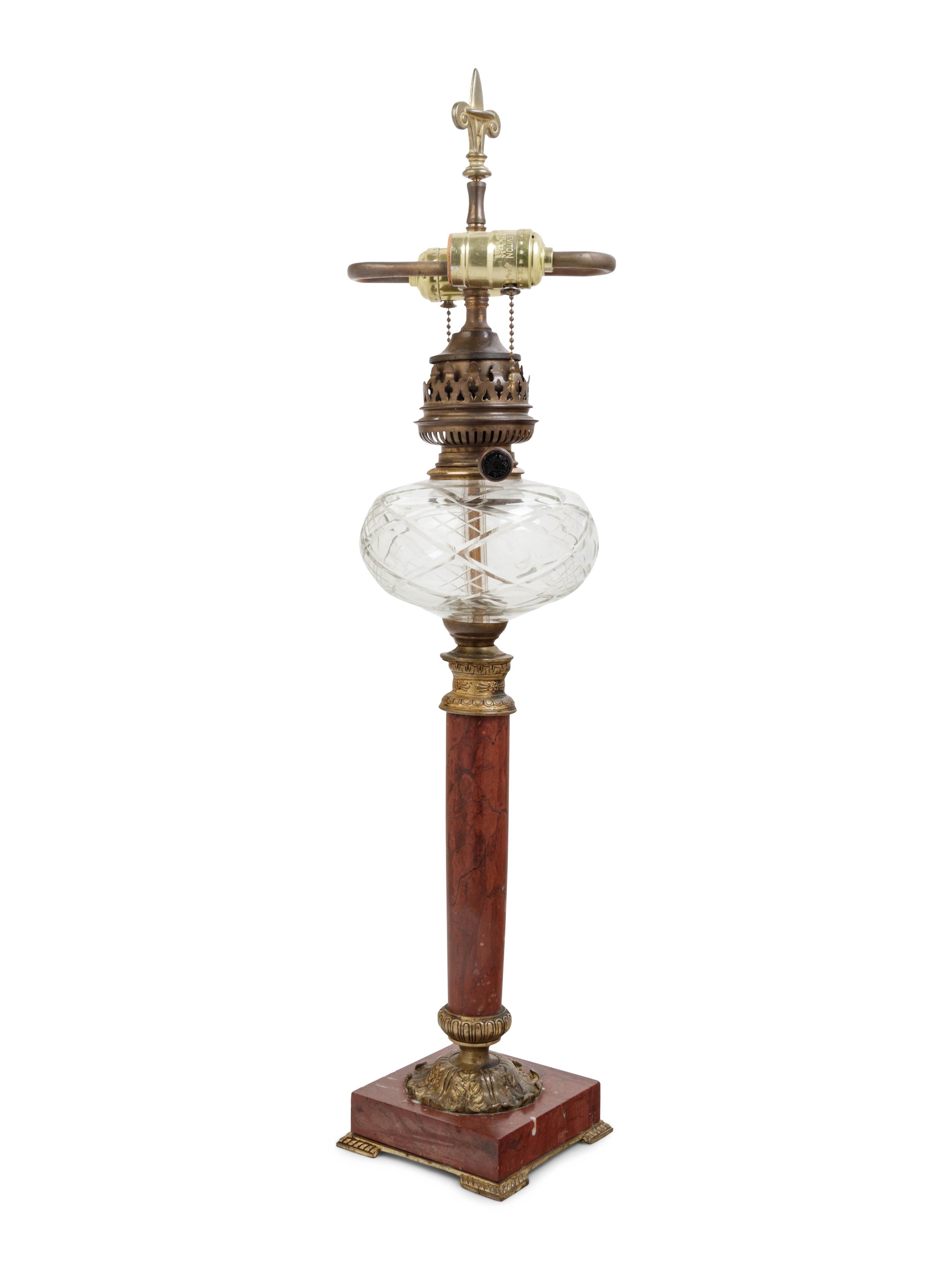 A Continental Gilt Bronze and Marble Fluid Lamp Converted to Electricity