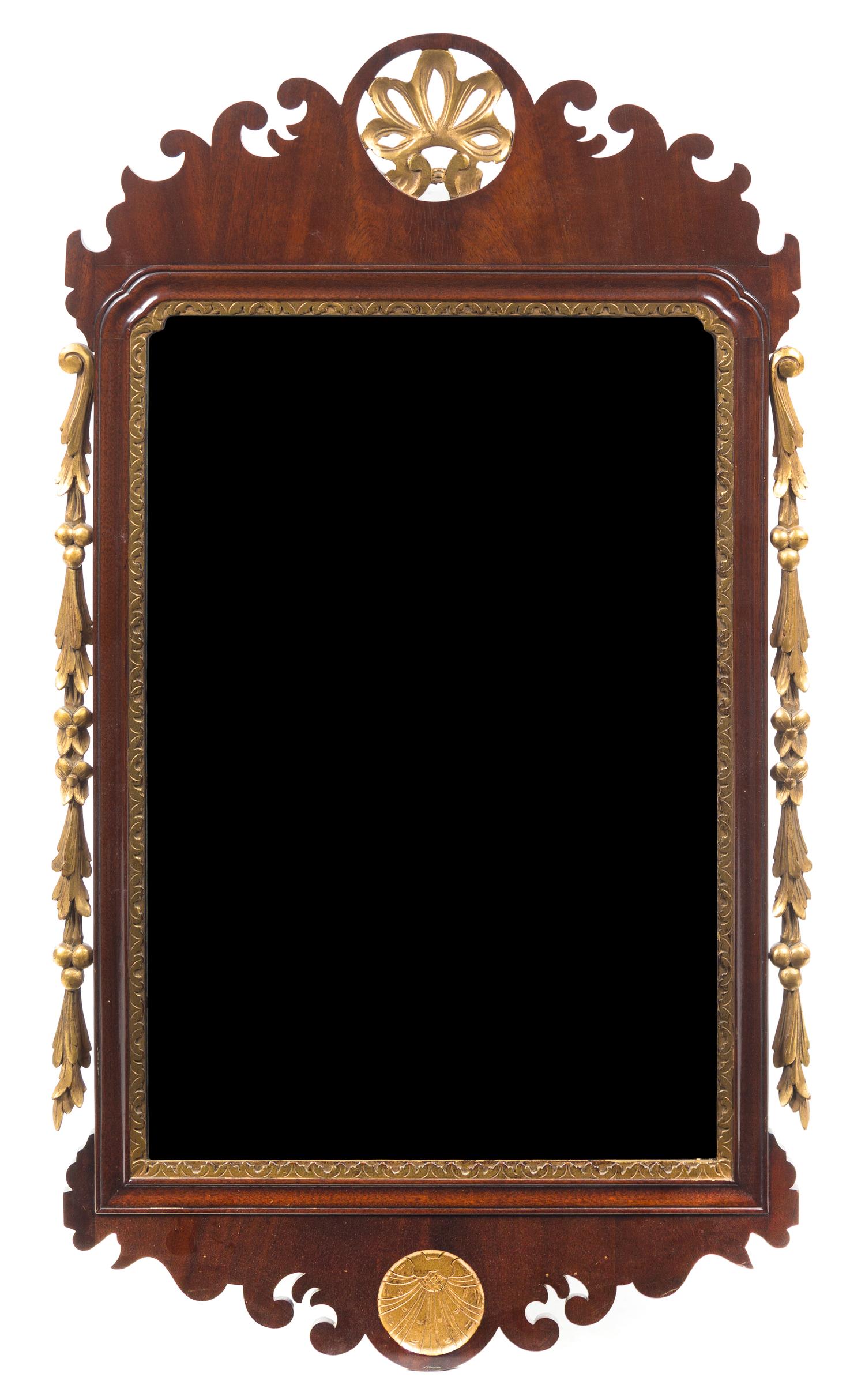 A Chippendale Style Parcel-Gilt Mahogany Mirror Height 47 x width 25 1/2 inches — 20TH CENTURY