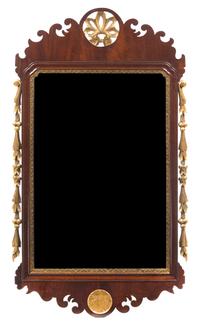 A Chippendale Style Parcel-Gilt Mahogany Mirror Height 47 x width 25 1/2 inches — 20TH CENTURY