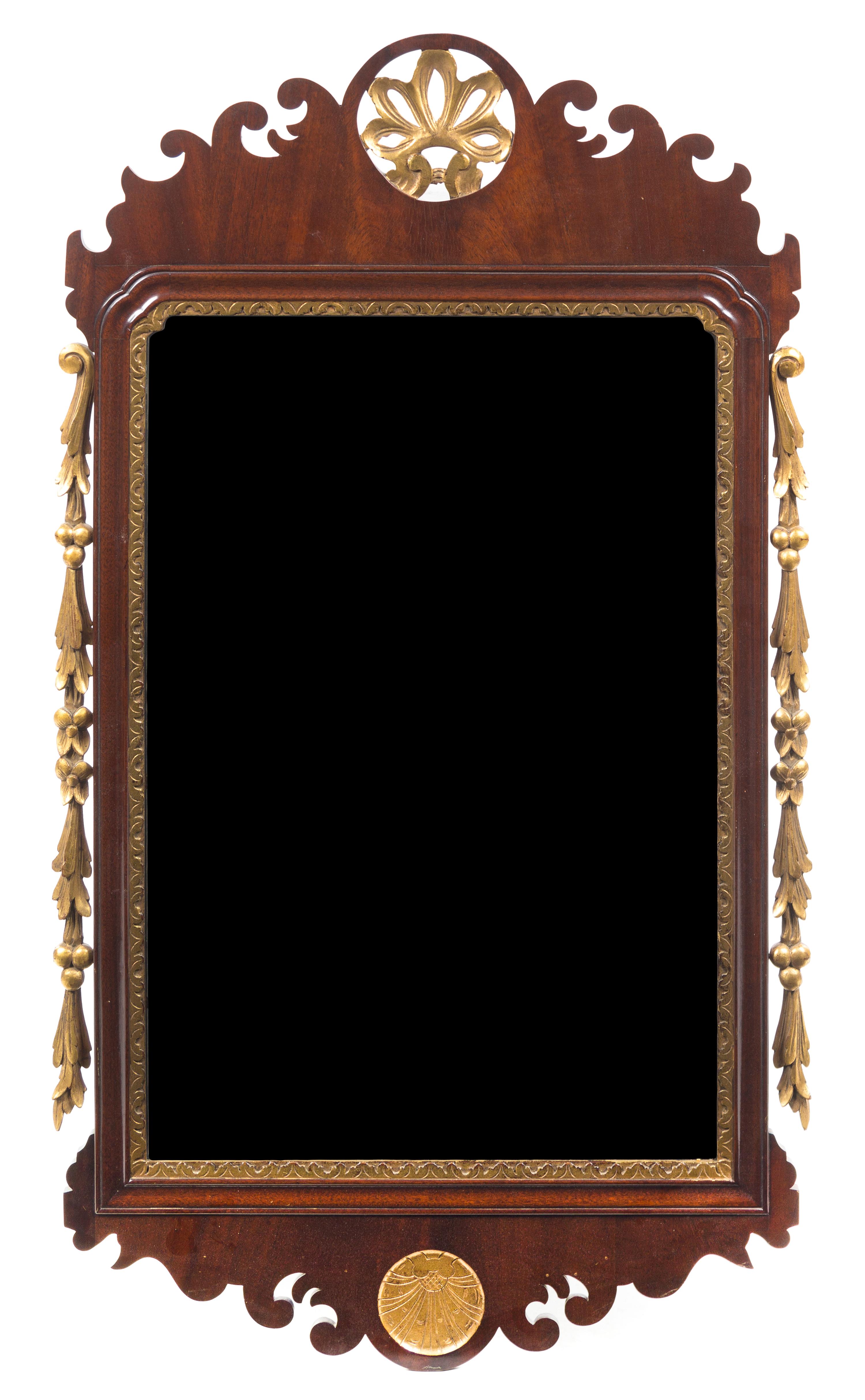 A Chippendale Style Parcel-Gilt Mahogany Mirror Height 47 x width 25 1/2 inches — 20TH CENTURY