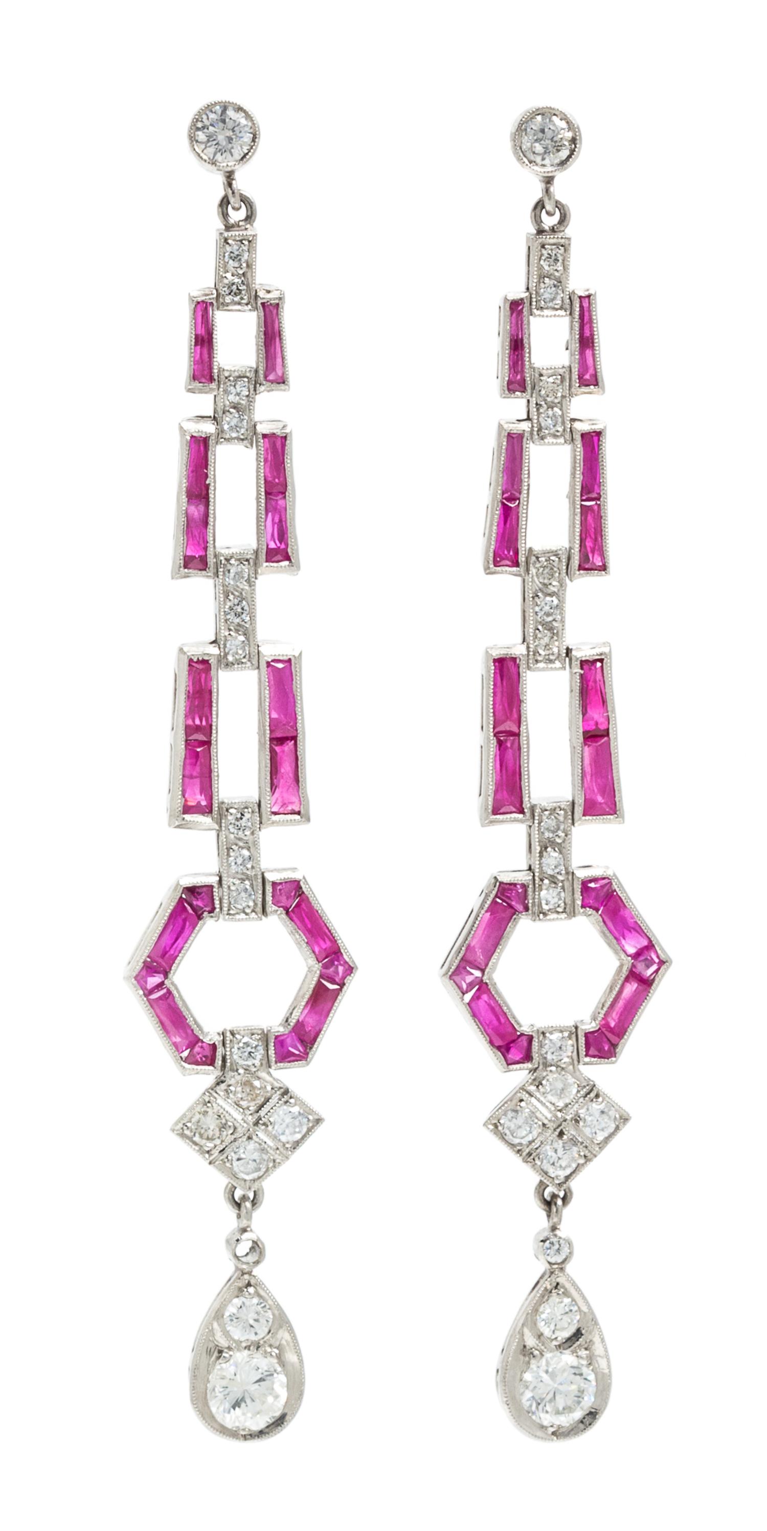 A Pair of Platinum, Ruby and Diamond Dangle Earrings, 6.50 dwts.