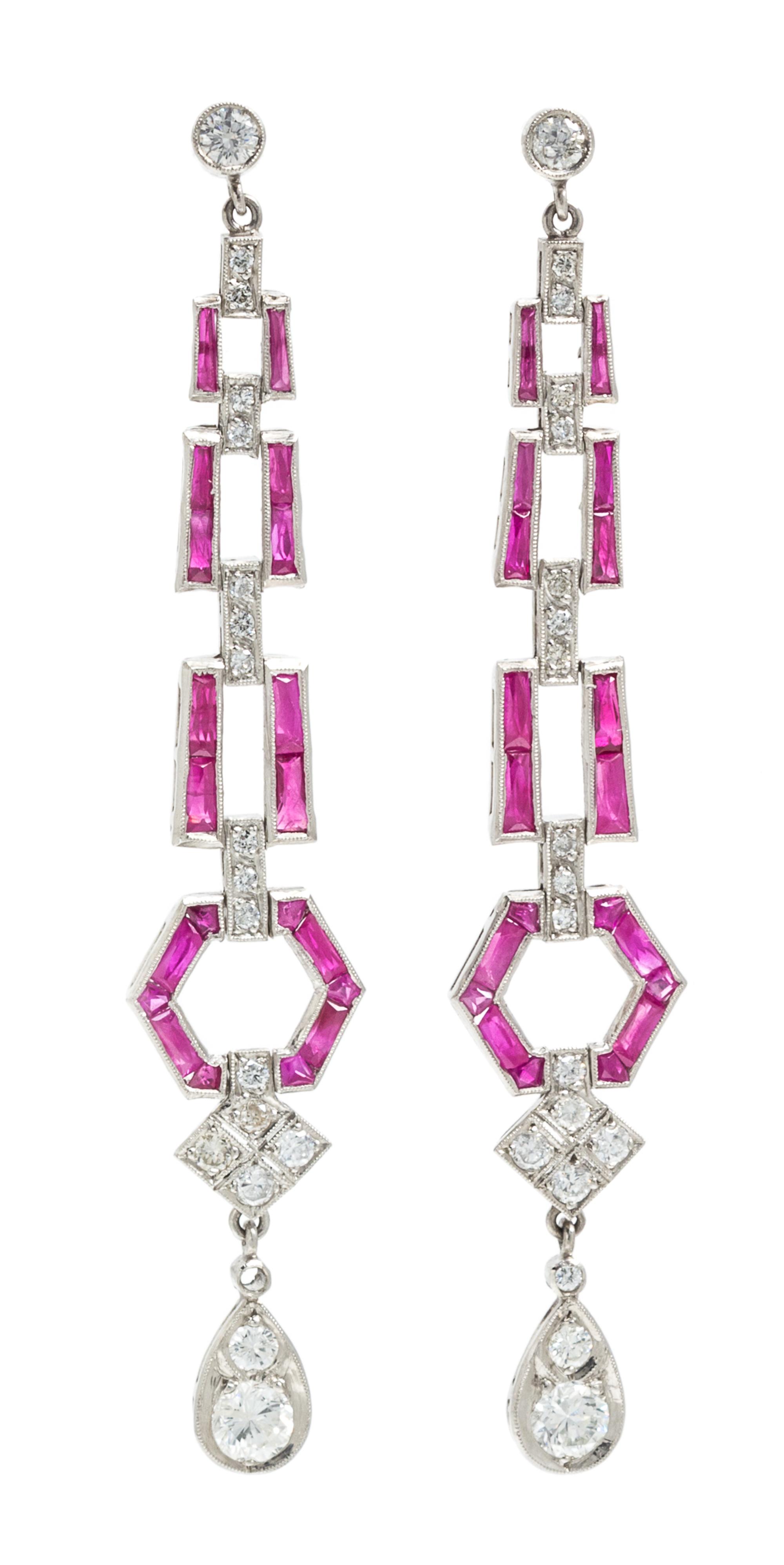 A Pair of Platinum, Ruby and Diamond Dangle Earrings, 6.50 dwts.