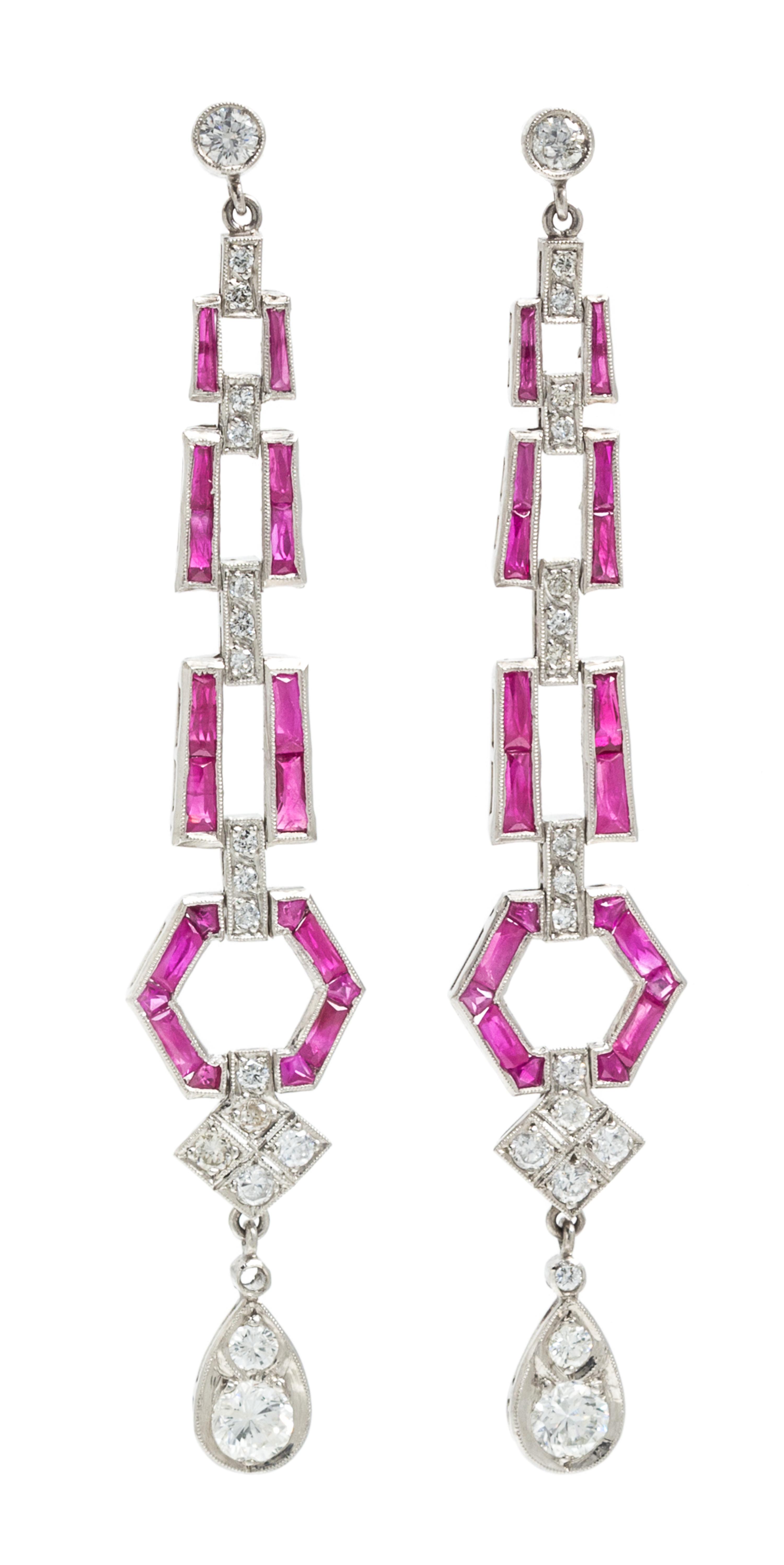 A Pair of Platinum, Ruby and Diamond Dangle Earrings, 6.50 dwts.