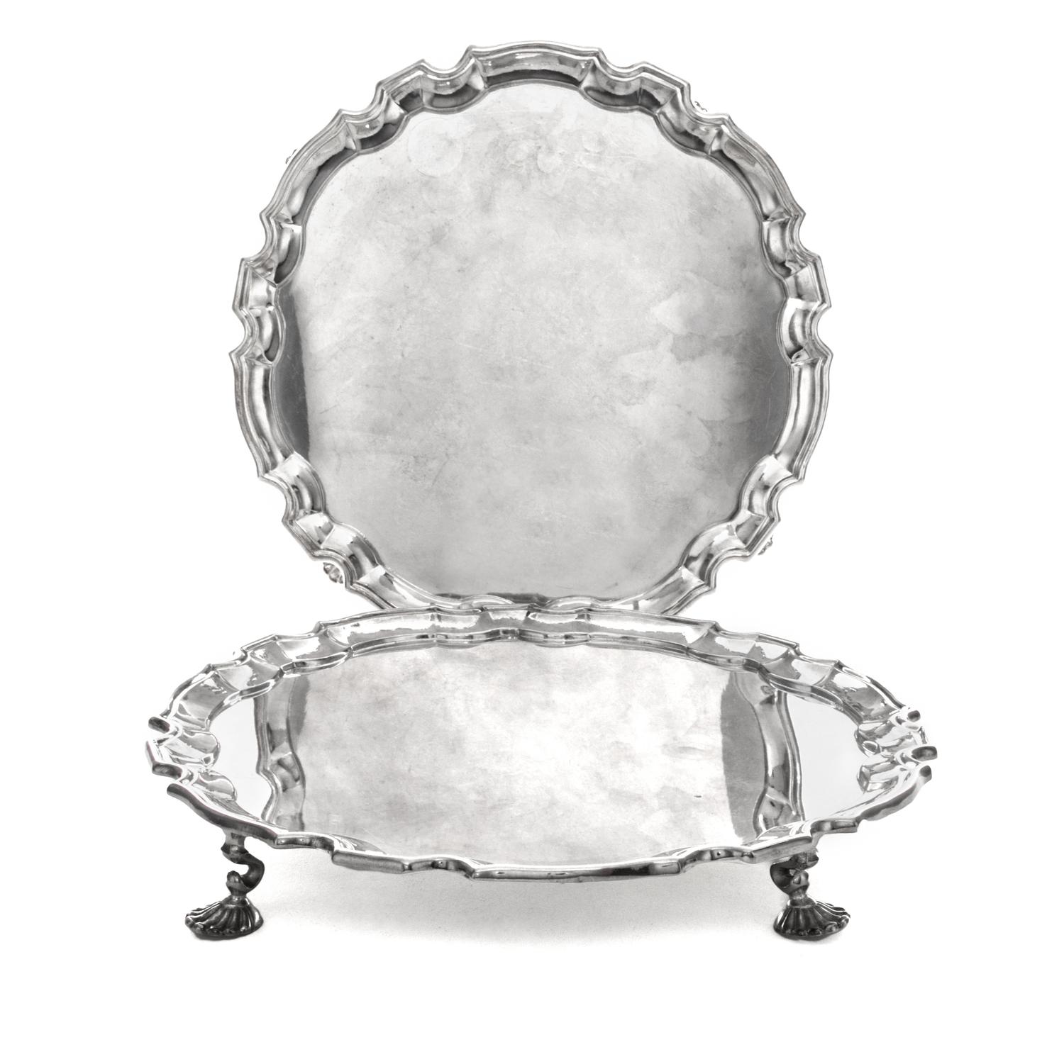 A Pair of American Silver-Plate Salvers, Gorham Mfg. Co., Providence, RI, each of circular form with pie-crust edge, raised on four she