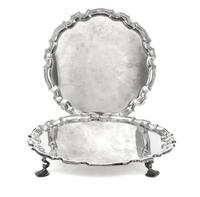 A Pair of American Silver-Plate Salvers, Gorham Mfg. Co., Providence, RI, each of circular form with pie-crust edge, raised on four she